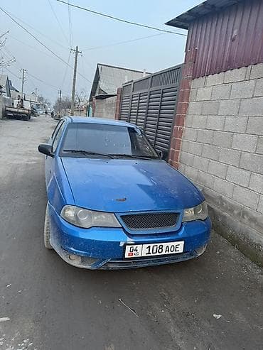 автомобиль уаз: Седан синего цвета, 4 двери, кузов классической формы. Основные — 1