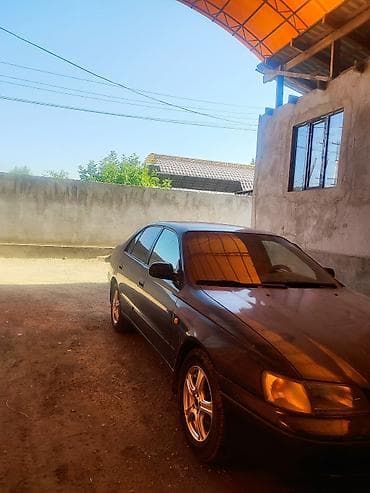 салквн тор: Toyota Carina E: 1995 г., Механика, Бензин, Седан — 5