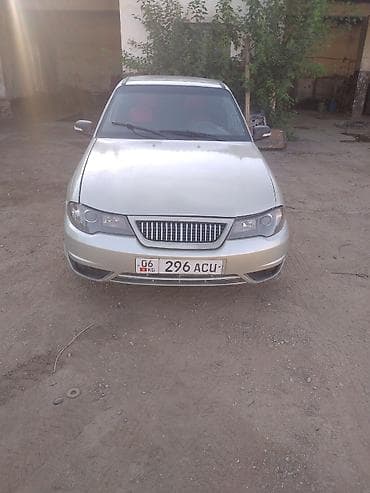 byd e7: Седан серебристого цвета. Основные характеристики и оснащение: - — 2