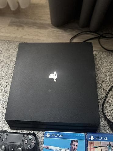 PS4 (Sony PlayStation 4): PlayStation 4 Pro на 1 трб (черный) — комплект Из игр гта5 фотртнайт(с — 2