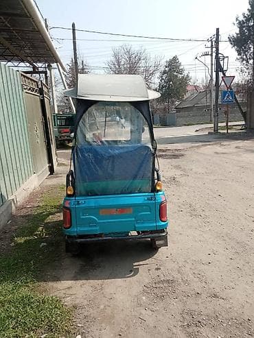 Книги и журналы: Электрический трицикл (рикша) с крышей и закрытой передней кабиной — 3