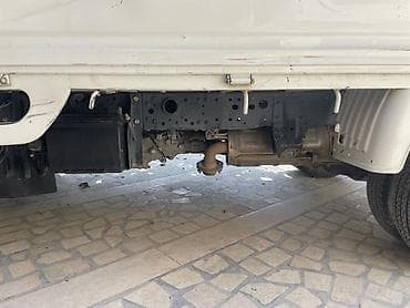 Компактный бортовой малотоннажный грузовик Nissan (правый руль) — 9