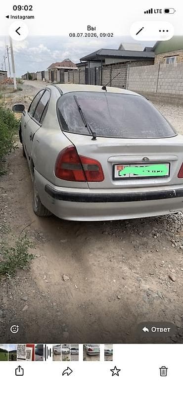 каропка митсубиси: Mitsubishi Carisma: 2001 г., Седан — 1
