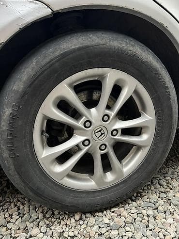Комплект колес Honda: оригинальные литые диски и летние шины — 1