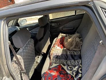 Унаа: Daewoo Nexia: 2004 г., Кол менен иштөөчү, Седан — 2