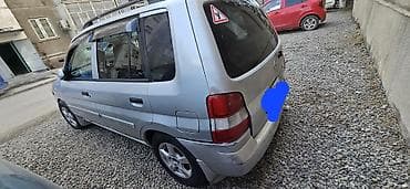 значок мазда: Mazda Demio: 2000 г., 1.3 л, Автомат, Бензин, Универсал — 5