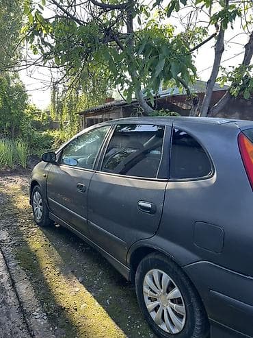 Транспорт: Nissan Almera Tino: 2004 г., 1.8 л, Кол менен иштөөчү, Бензин, Хетчбек — 2