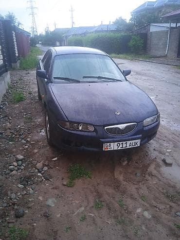 bye e5: Mazda XEDOS 6: 1994 г., 1.6 л, Механика, Бензин, Седан — 4