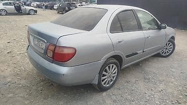 byd plus: Серебристый седан компакт-класса. Основные характеристики: - Кузов — 3