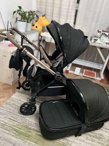детские зимние прогулочные коляски: Коляска, цвет - Черный, Б/у — 1