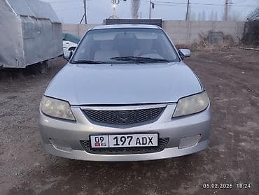 Mazda 323: 2003 г., 1.6 л, Механика, Бензин, Хэтчбэк