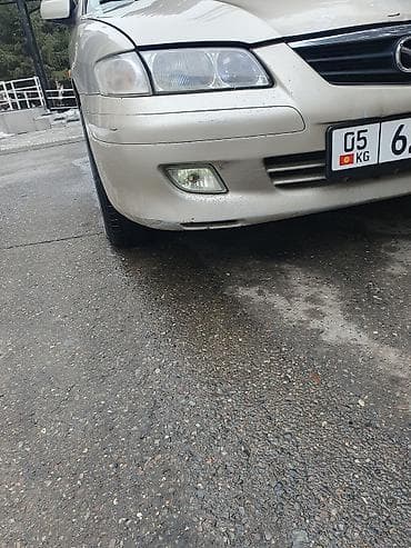 mazda диски: Mazda 626: 2000 г., 2 л, Механика, Газ, Седан — 7
