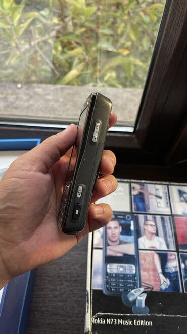 простые телефоны: Nokia N73, Б/у, < 2 ГБ, цвет - Черный, 1 SIM — 4