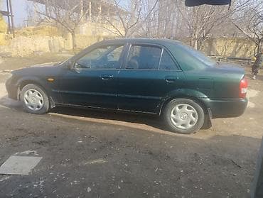 4 5мм: Mazda 323: 2001 г., 1.6 л, Автомат, Бензин, Седан — 3