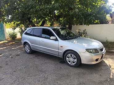 5: Mazda Familia: 2003 г., 1.6 л, Механика, Бензин, Универсал — 2