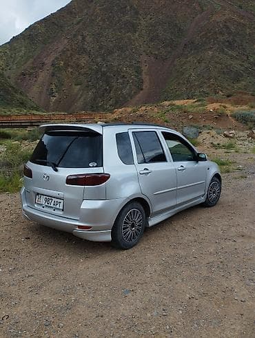Mazda Demio: 2003 г., 1.3 л, Механика, Бензин, Хэтчбэк — 1
