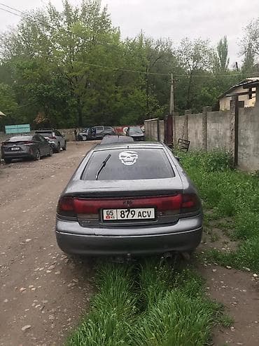 step 2: Mazda 626: 1996 г., 1.8 л, Бензин, Лифтбек — 1