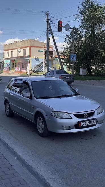 mini kooper: Mazda 323: 2001 г., 1.6 л, Ручные, Бензин, Хэтчбэк — 3