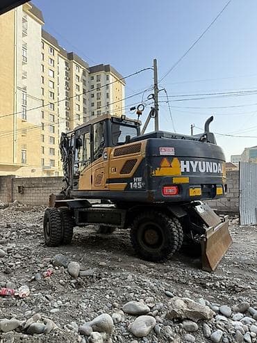 хундай 145: Экскаватор, Hyundai, Дөңгөлөктүү — 2