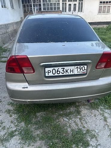 зил 331: Honda Civic: 2001 г., Седан — 5