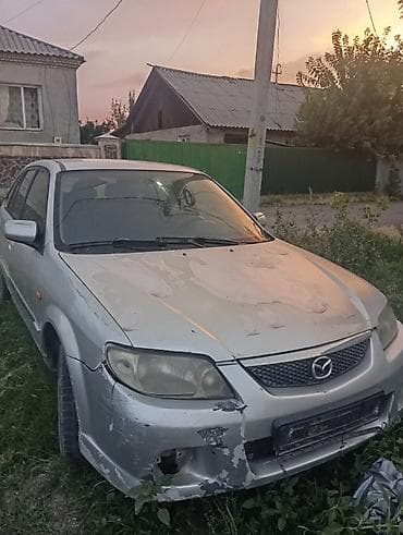 Mazda Familia: 2003 г., Универсал — 2