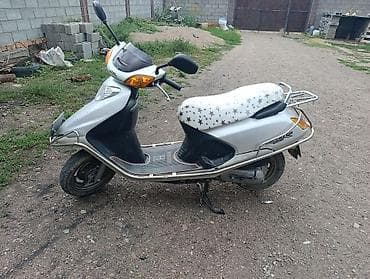 мото тур эндуро: Скутер Honda Dio (серия AF) серебристого цвета. бензин - Компактный — 2