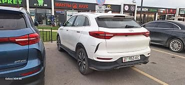 mazda 121: Электромобиль кроссовер (белый), купеобразный силуэт. Основные — 4