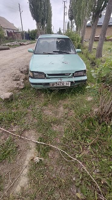 Mazda 323: 1989 г., Седан