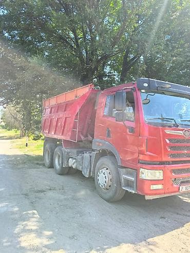 кури: Самосвал FAW (6x4) Описание: - Трехосный самосвал с — 3