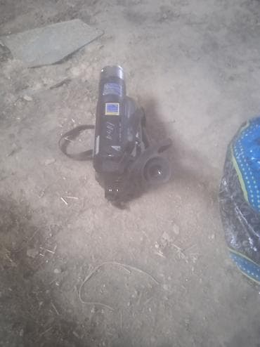 Видеокамера форм‑фактора «handycam» с плечевым ремнем. Основные