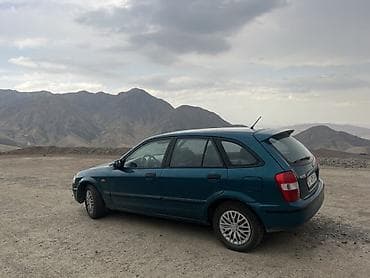 турбо зарядка: Mazda 323: 1999 г., 1.5 л, Автомат, Бензин, Универсал — 5