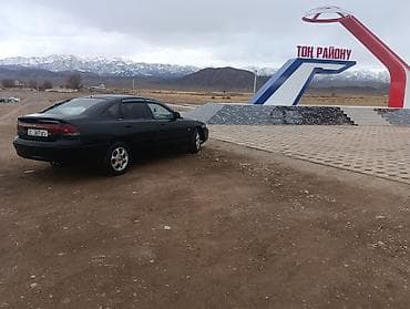 ml 163: Mazda 626: 1992 г., Седан — 7