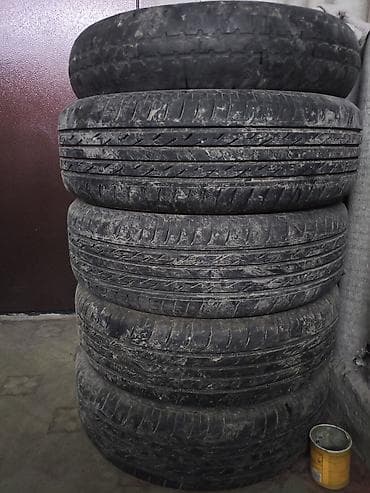 r15 ist: Комплект автомобильных шин + докатка на штампованном диске. - — 4