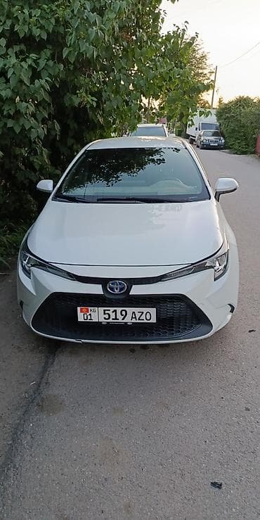 e2 byd: Toyota Corolla: 2023 г., Бензин, Седан — 1