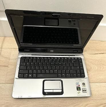 оптом наушник: HP Pavilion dv2000 – мультимедийный ноутбук с глянцевым дисплеем — 1