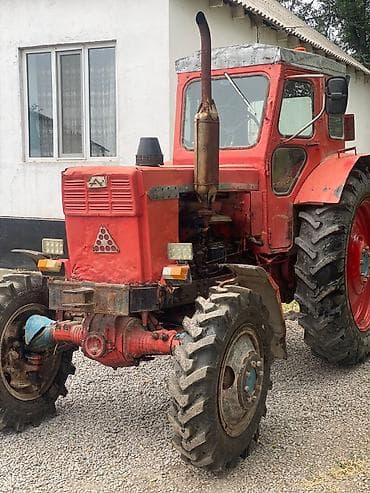 троктор 80: Трактор колесный, красный, полноприводный (формула 4×4). Кабина — 1