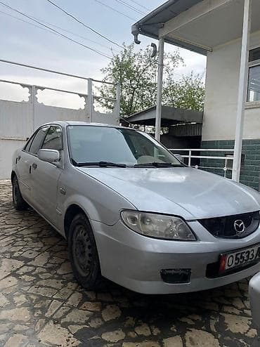 crv 5: Mazda 323: 2003 г., 1.4 л, Механика, Бензин, Седан — 2