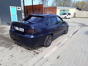 тюнинг глушителя: Обмен бар Основные особенности: - Кузов: 4-дверный седан, темно‑синий — 4