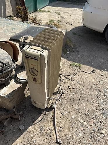 Масляный обогреватель Кол-во секций: 7