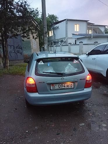 mazda demio 2004: Mazda 323: 2002 г., Механика, Хэтчбэк — 4
