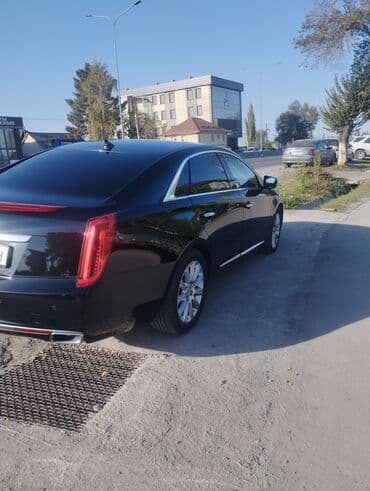 авто выхлоп: Cadillac : 2013 г., 2 л, Автомат, Бензин, Седан — 3