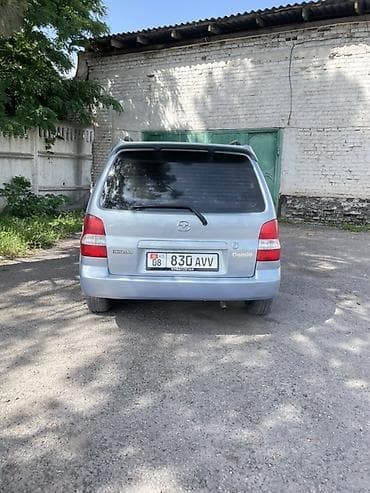 бар авто: Mazda Demio: 2001 г., 1.3 л, Кол менен иштөөчү, Бензин, Хетчбек — 8