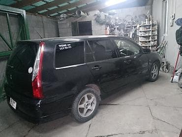 Mitsubishi Lancer: 2001 г., 1.8 л, Вариатор, Бензин, Универсал