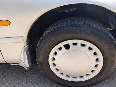 колпачки: Mazda Cronos: 1992 г., 2 л, Механика, Бензин, Седан — 3
