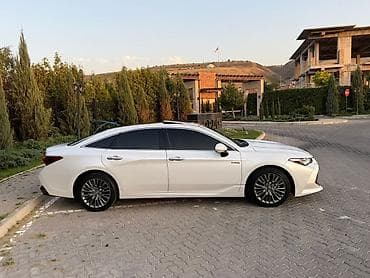 tayota karina e: Toyota Avalon: 2020 г., 2.5 л, Вариатор, Гибрид, Седан — 2