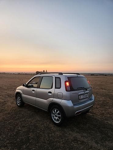 Унаа сатуу: Suzuki Ignis: 2002 г., 1.3 л, Кол менен иштөөчү, Бензин, Хетчбек — 3