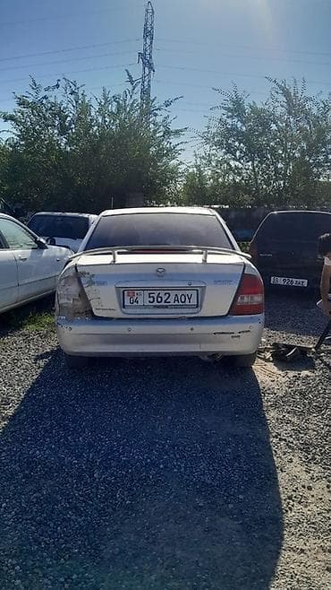 mazda 626 кронос: Mazda Familia: 2002 г., 1.6 л, Автомат, Бензин, Седан — 3