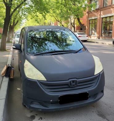 Honda Stepwgn: 2005 г., 2 л, Автомат, Газ, Минивэн