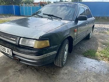 авто жак: Mazda 323: 1989 г., 1.5 л, Кол менен иштөөчү, Бензин, Седан — 2