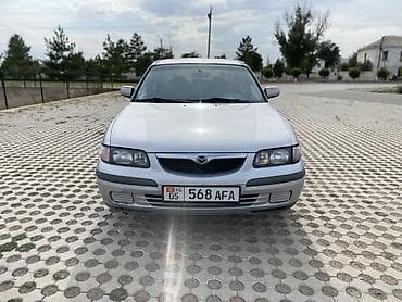 down pipe: Mazda 626: 1998 г., 2 л, Механика, Бензин, Седан — 2